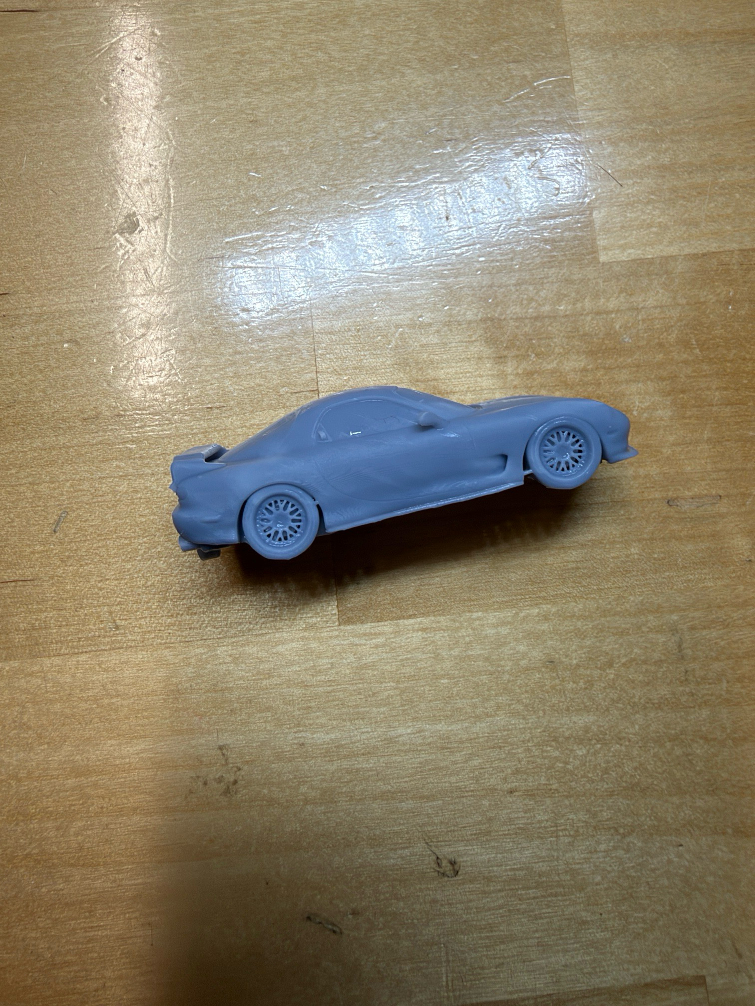 Rear three-quarter RX-7 keychain view